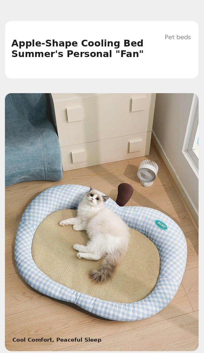 Nekono Babe apple-shaped cooling cat bed with kitten lounging on woven rattan mat in blue gingham
