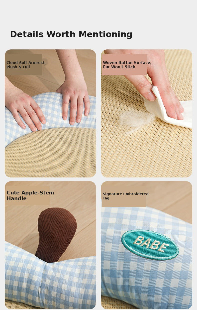 Close-up details of Nekono Babe cat bed — plush armrest, woven rattan surface, apple-stem handle and embroidered Babe tag