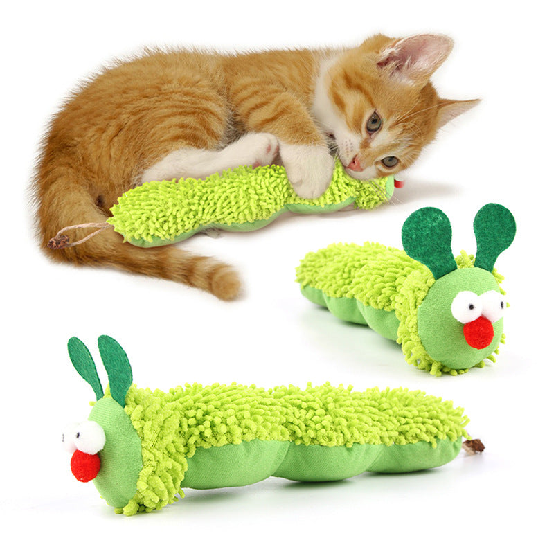 A ginger kitten pouncing on multiple Nekono caterpillar toys, highlighting engagement and play