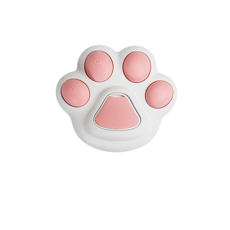 Close-up of the Nekono MistBrush in a cute cat paw design, pink and white color
