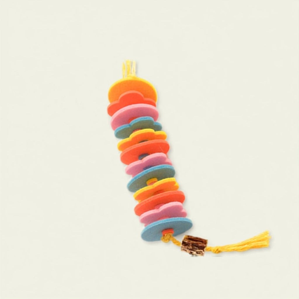 Full view of the R.U.S.H. silvervine cat toy showing rainbow felt discs, silvervine wood piece and yellow tassel