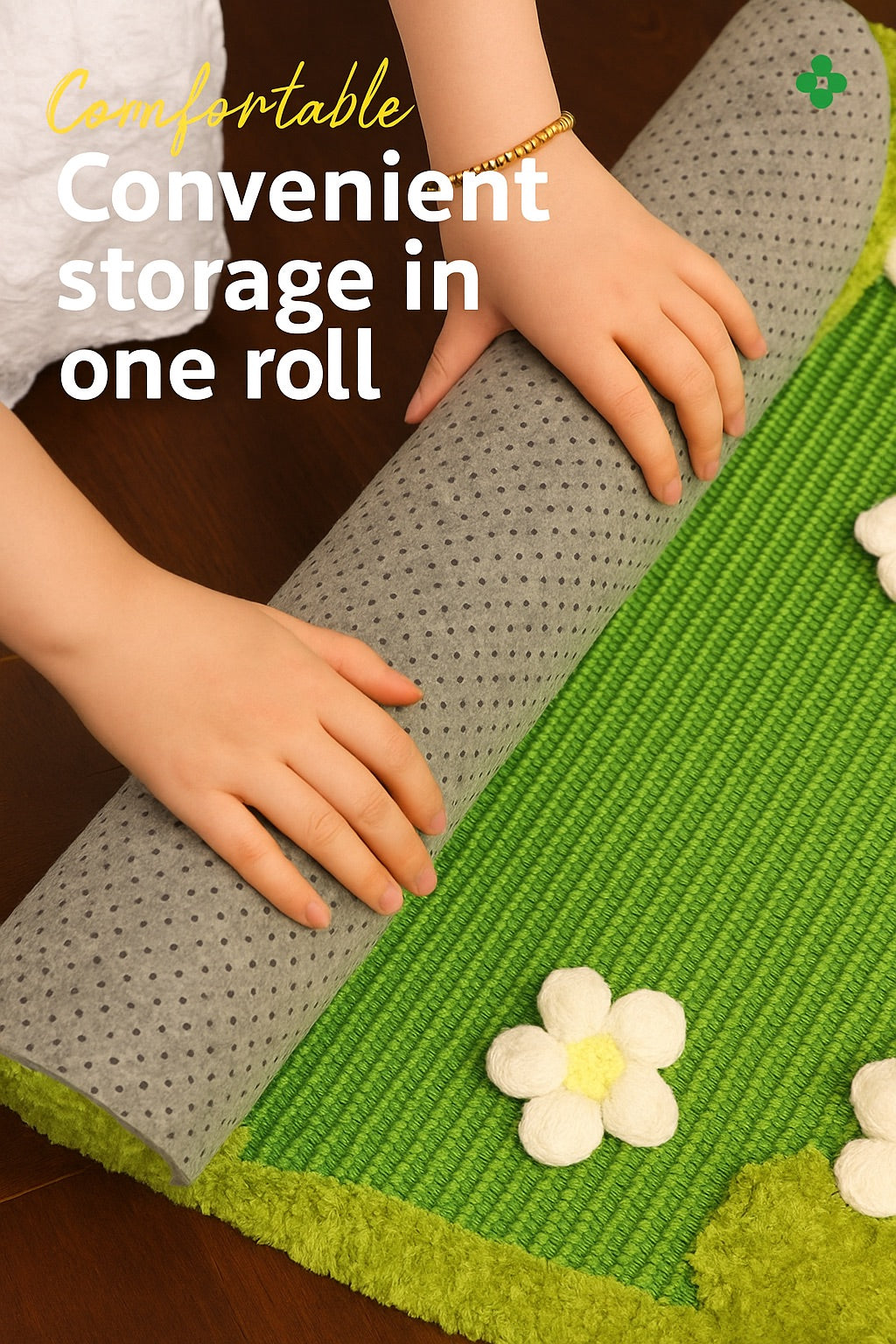 Hands rolling up the Nekono Spring Meadow rug to show the grey anti-slip rubber backing and its flexible, easy-to-store design.